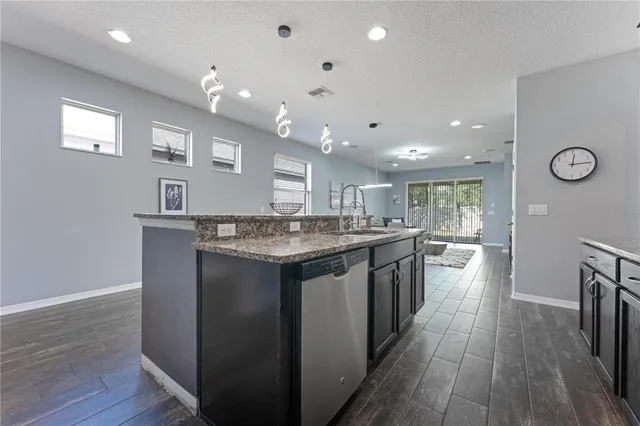 a living room with furniture and a table