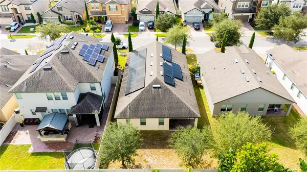 a view of a swimming pool with outdoor seating and yard