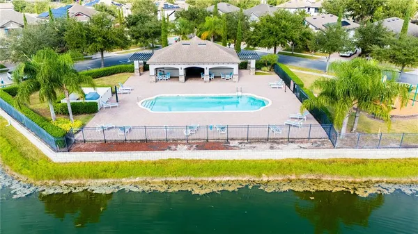 a bathroom with a granite countertop sink mirror and toilet