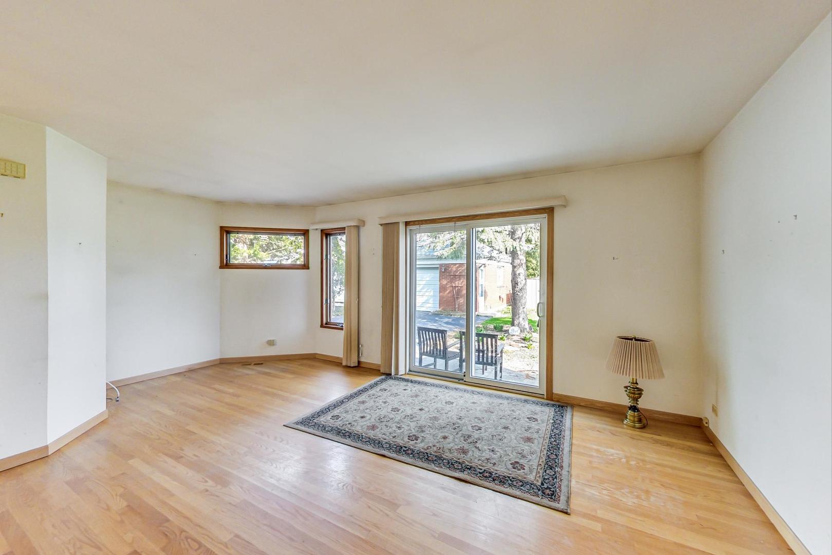 2024 Central Road Glenview, IL 60025 - Photo 6 of 15 a view of an empty room with a window