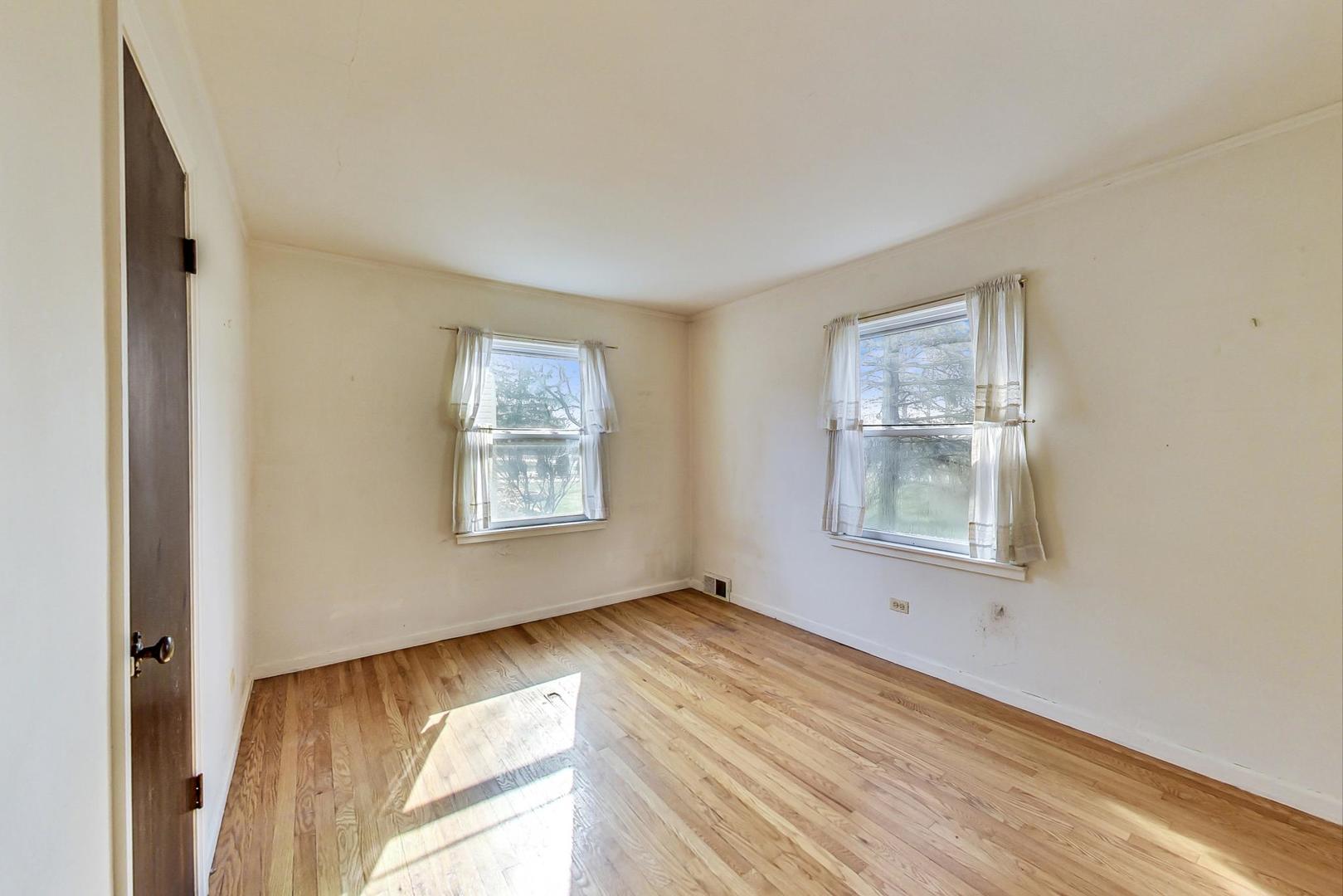 2024 Central Road Glenview, IL 60025 - Photo 10 of 15 a view of an empty room with a window
