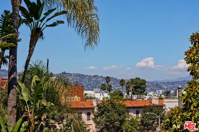 a view of front door with a mirror