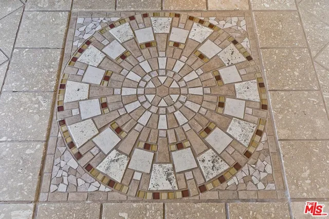 a street sign and a wall painting