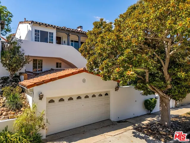 a view of house with yard