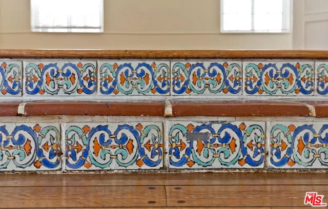 a view of a livingroom with wooden floor