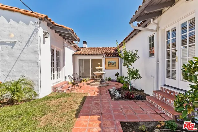 a house view with a outdoor space