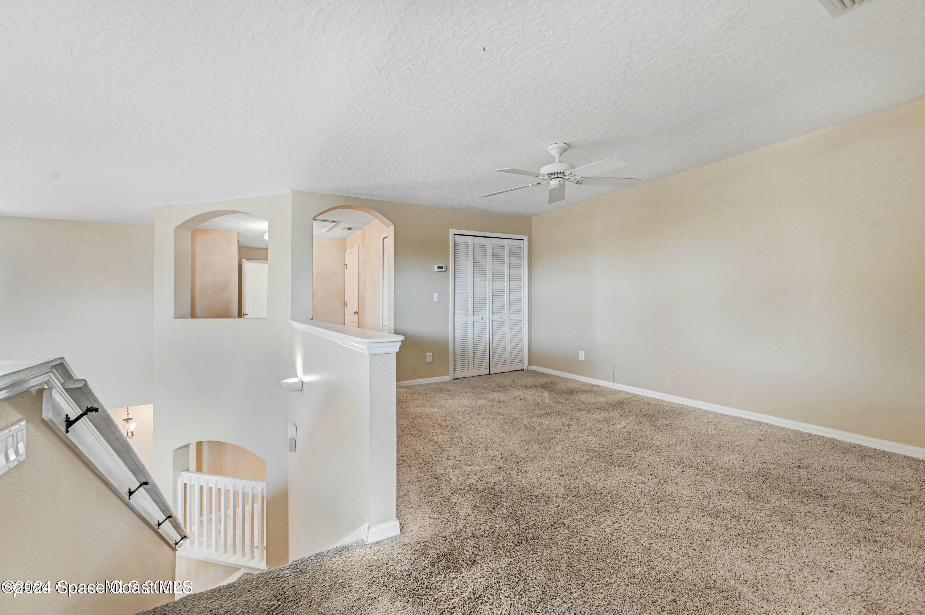 244 Intrepid Way Indialantic, FL 32903 - Photo 23 of 42 a view of an empty room with a window