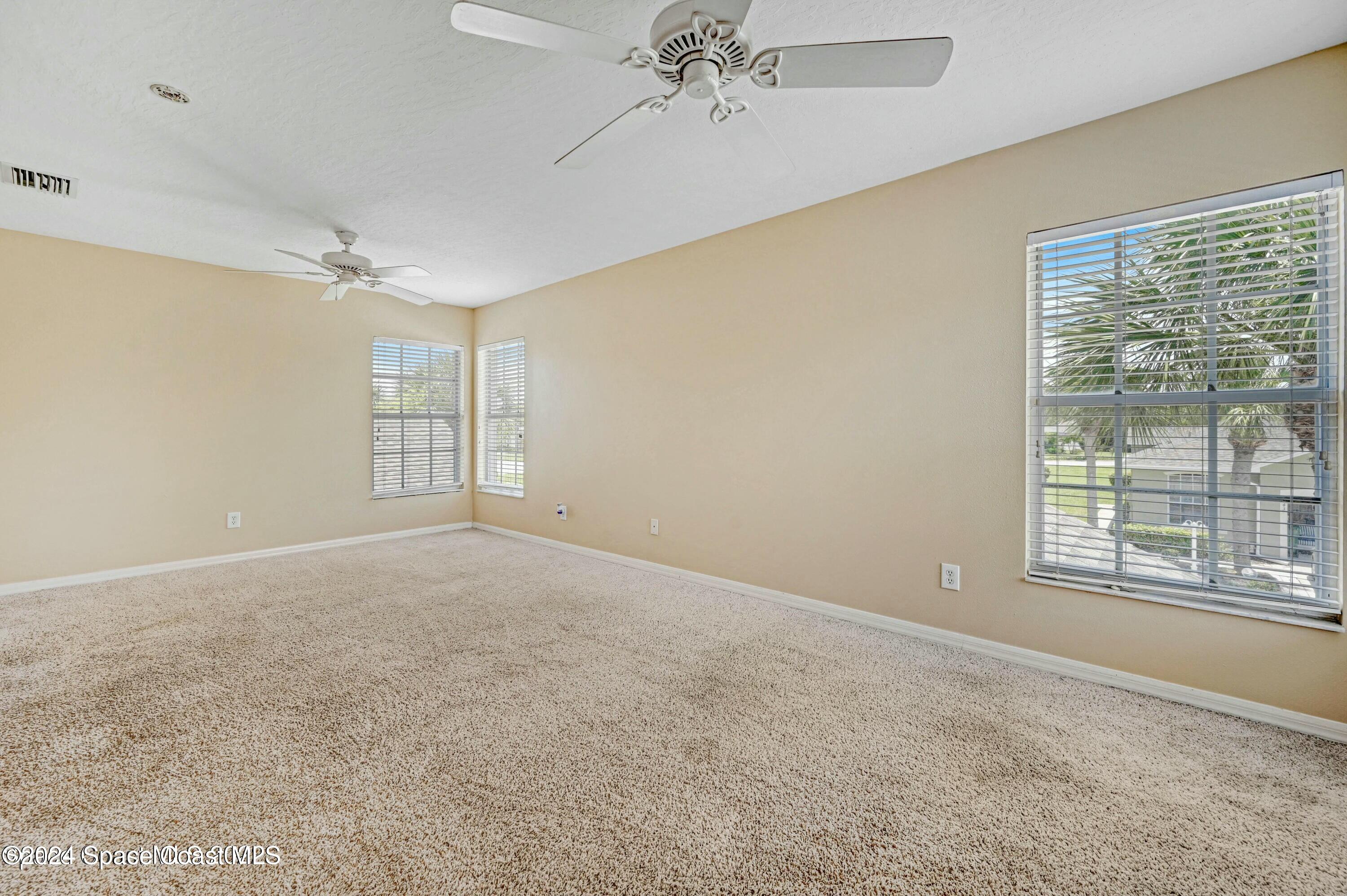 244 Intrepid Way Indialantic, FL 32903 - Photo 29 of 42 a view of an empty room with a window