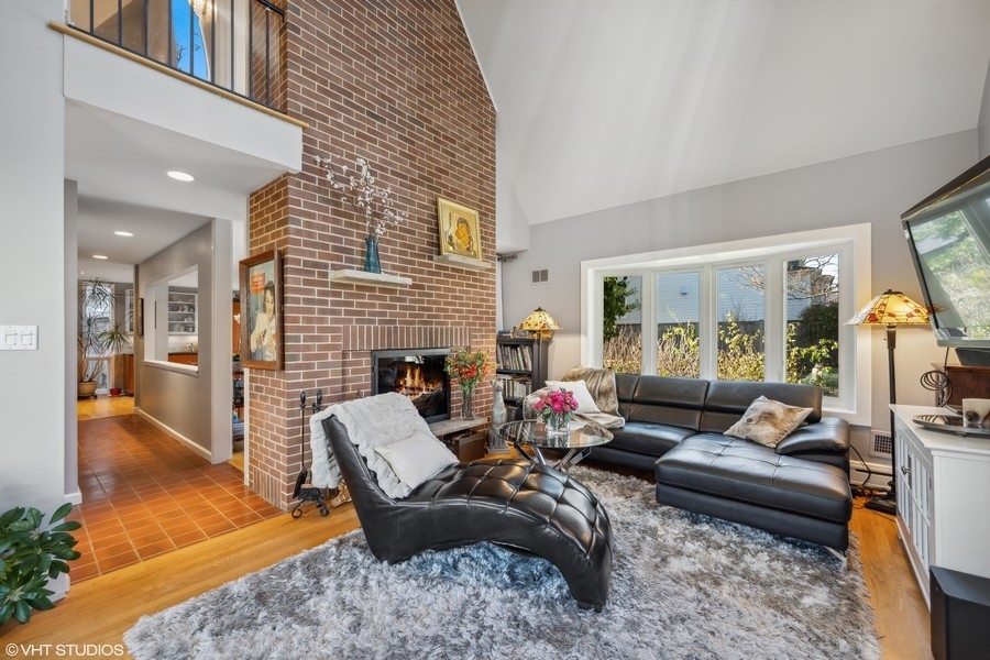 290 Poplar Street Winnetka, IL 60093 - Photo 11 of 55 a living room with furniture rug and a table