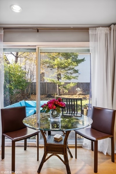 290 Poplar Street Winnetka, IL 60093 - Photo 17 of 55 a view of a dining room with furniture window and outside view