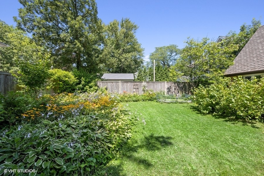 290 Poplar Street Winnetka, IL 60093 - Photo 53 of 55 a view of a house with a yard