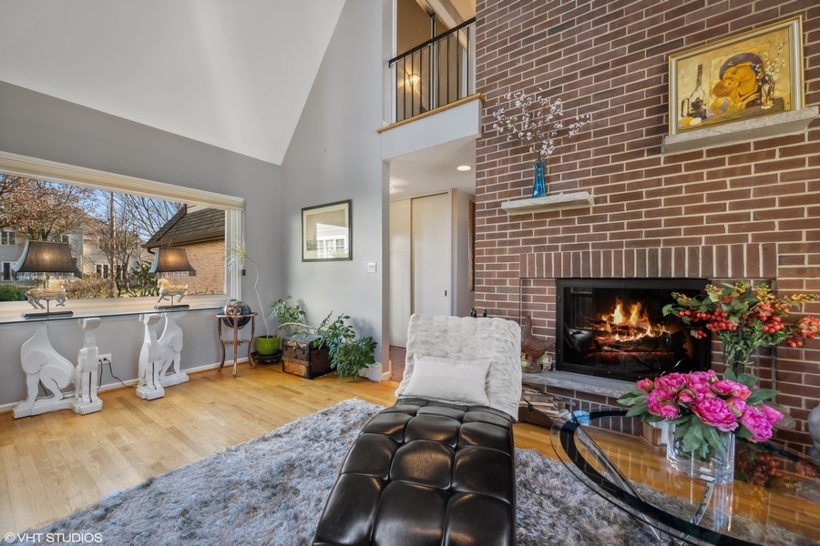 290 Poplar Street Winnetka, IL 60093 - Photo 7 of 55 a living room with furniture and a fireplace