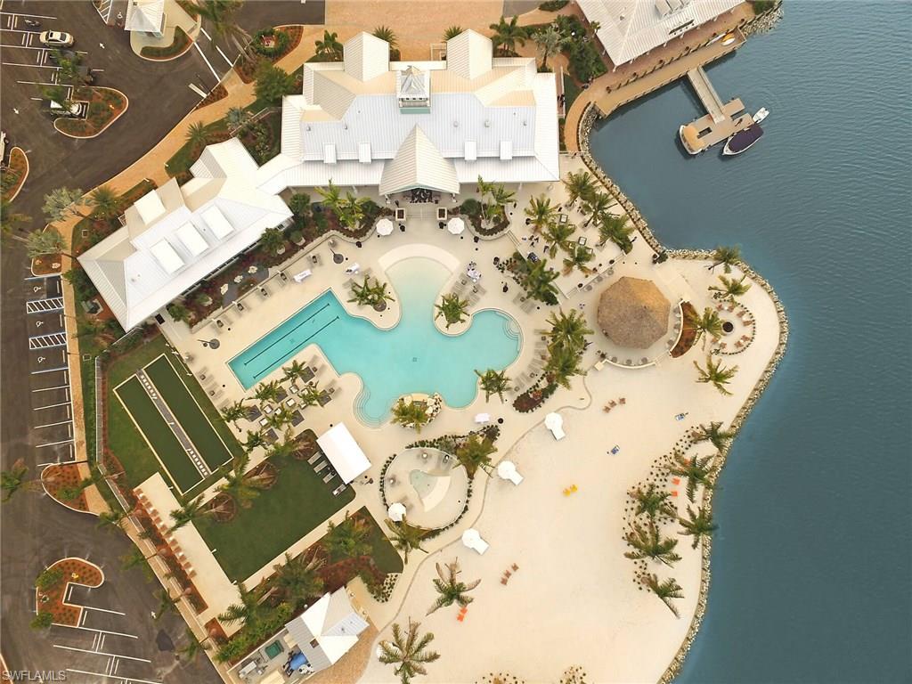 14533 Edgewater Circle Naples, FL 34114 - Photo 2 of 24 an aerial view of a fireplace with wooden floor