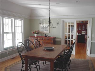 15 Elgin Road Pocasset, MA 02559 - Photo 13 of 29 a view of a dining room with furniture window and wooden floor