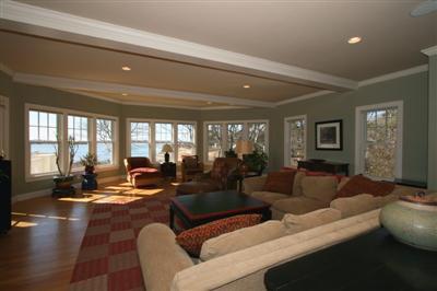 15 Elgin Road Pocasset, MA 02559 - Photo 14 of 29 a living room with furniture and large windows