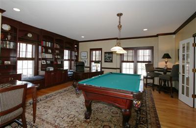 15 Elgin Road Pocasset, MA 02559 - Photo 16 of 29 a room with lots of furniture and windows