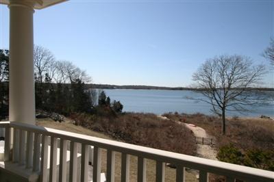 15 Elgin Road Pocasset, MA 02559 - Photo 2 of 29 a view of a balcony with wooden floor and outdoor space