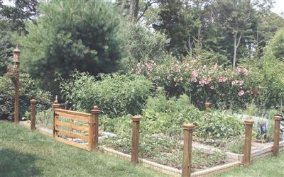 15 Elgin Road Pocasset, MA 02559 - Photo 29 of 29 a view of a wooden fence and trees