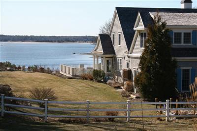 15 Elgin Road Pocasset, MA 02559 - Photo 3 of 29 a front view of a house with ocean view