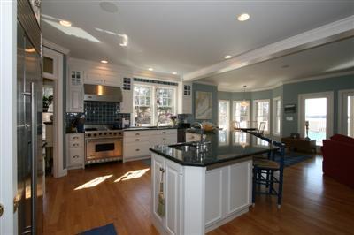 15 Elgin Road Pocasset, MA 02559 - Photo 10 of 29 a kitchen with stainless steel appliances granite countertop a sink a stove and refrigerator