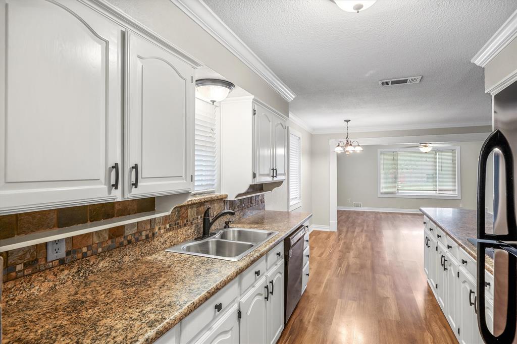 913 Pinson Road Forney, TX 75126 - Photo 7 of 19 Kitchen view toward the breakfast nook eating area.