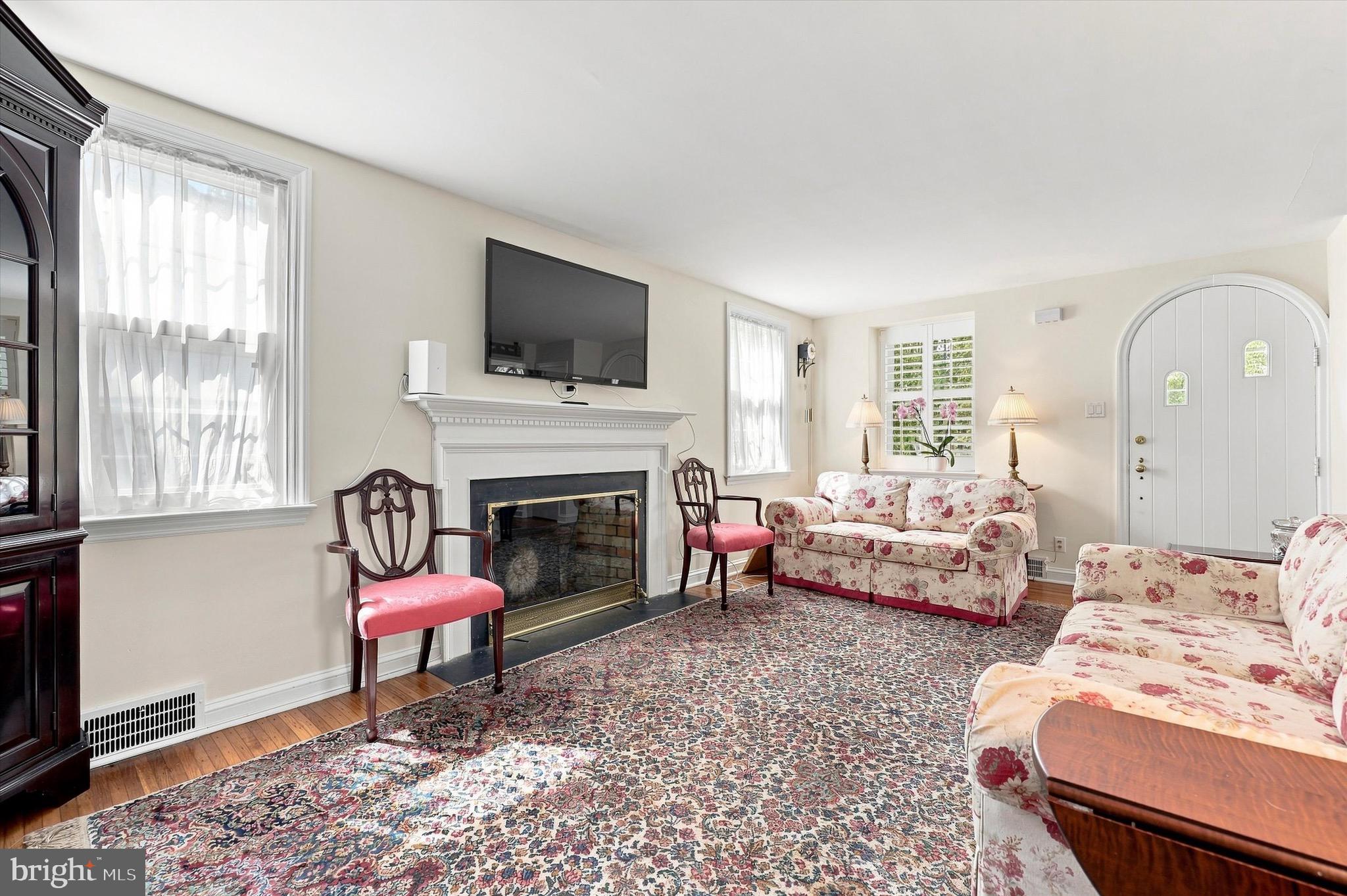 217 Williamsburg Road Ardmore, PA 19003 - Photo 8 of 26 Living room with fireplace