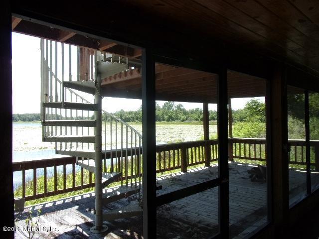 275 Huntington Shortcut Road Crescent City, FL 32112 - Photo 12 of 24 a view of a porch