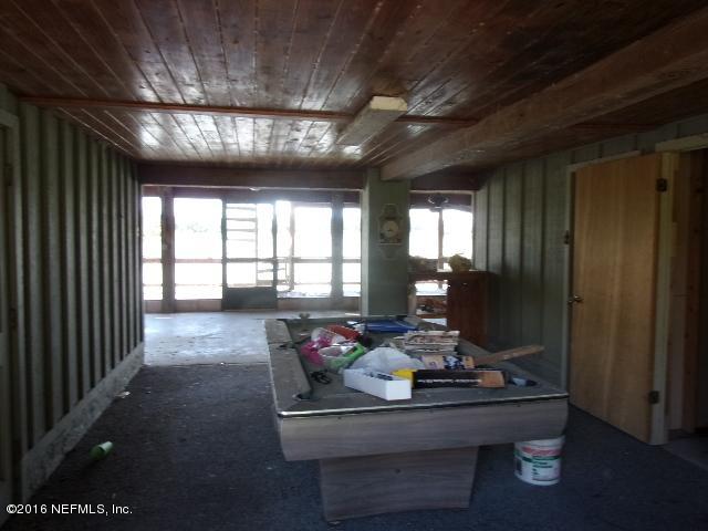 275 Huntington Shortcut Road Crescent City, FL 32112 - Photo 14 of 24 a room with furniture