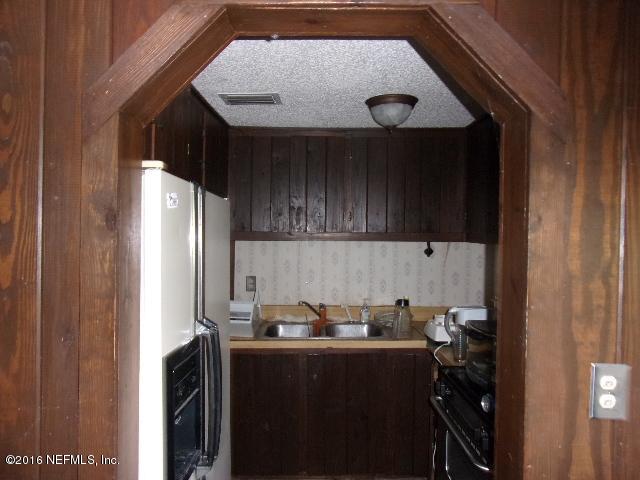 275 Huntington Shortcut Road Crescent City, FL 32112 - Photo 18 of 24 a room with storage and utility