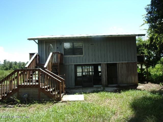 275 Huntington Shortcut Road Crescent City, FL 32112 - Photo 2 of 24 a view of house with front door