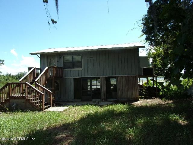 275 Huntington Shortcut Road Crescent City, FL 32112 - Photo 3 of 24 a view of a house with a yard