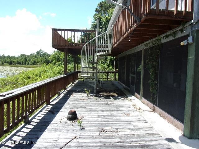 275 Huntington Shortcut Road Crescent City, FL 32112 - Photo 8 of 24 a view of balcony with wooden floor