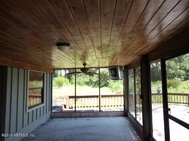 275 Huntington Shortcut Road Crescent City, FL 32112 - Photo 10 of 24 a view of an empty room with a window