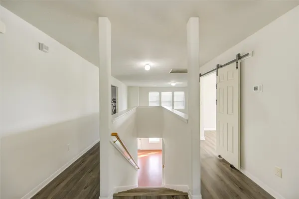 a view of entryway and kitchen