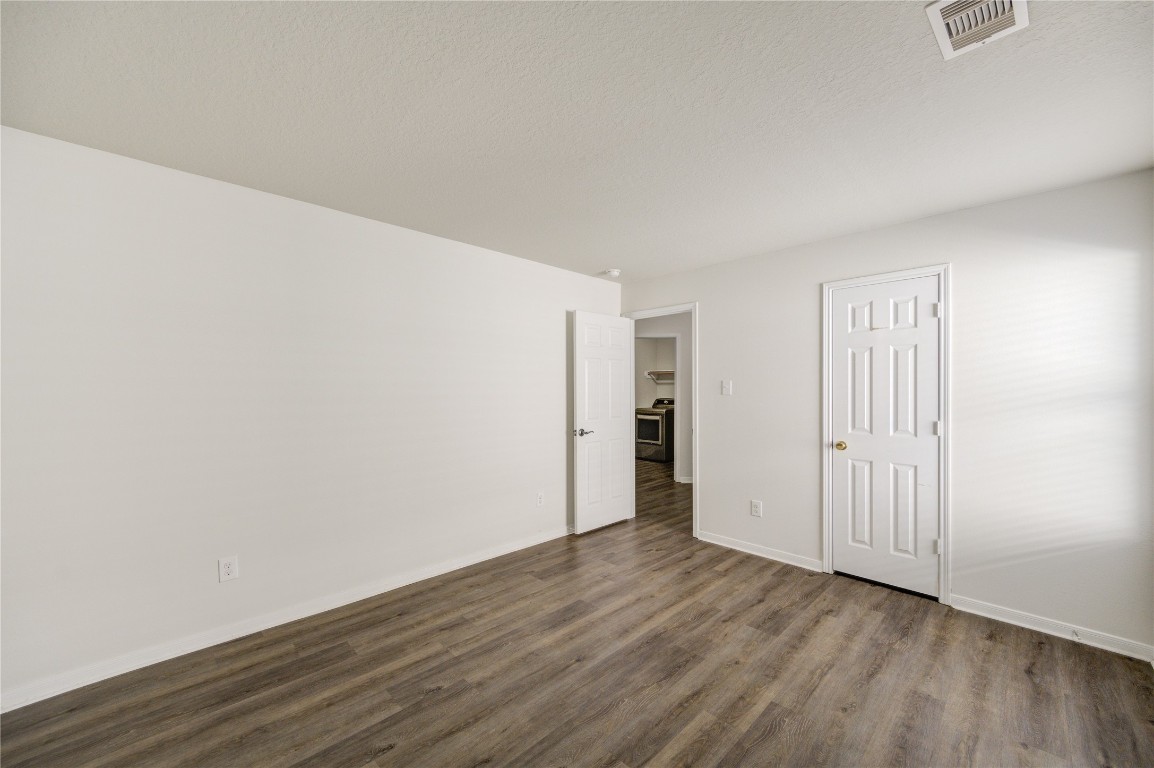 18434 Ranch View Trail Houston, TX 77073 - Photo 33 of 35 a view of an empty room with wooden floor