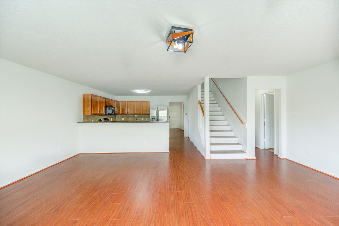 18434 Ranch View Trail Houston, TX 77073 - Photo 8 of 35 a view of an empty room with wooden floor