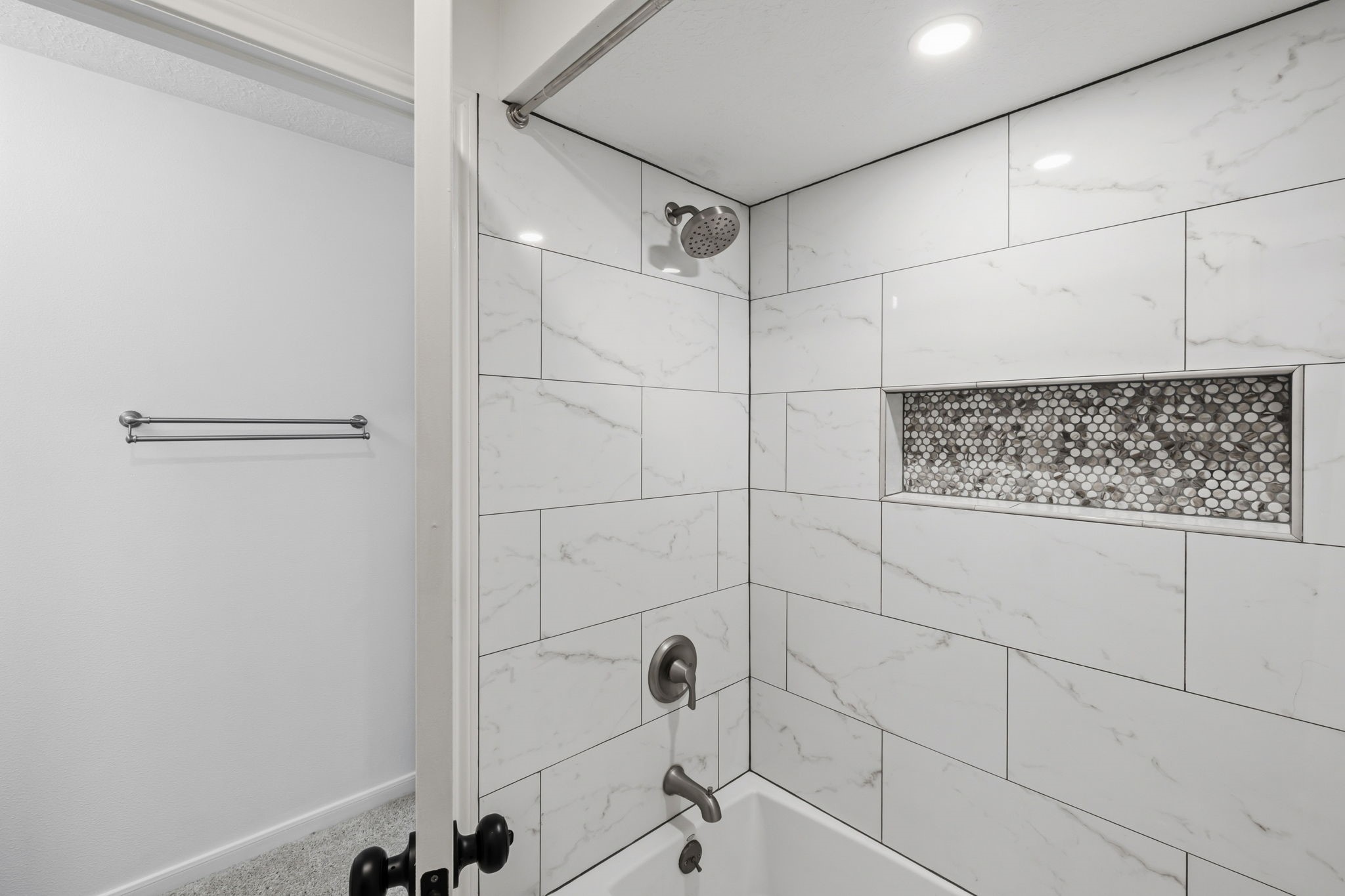 310 Pecan Loop Drive Baytown, TX 77523 - Photo 22 of 43 a bathroom with a shower