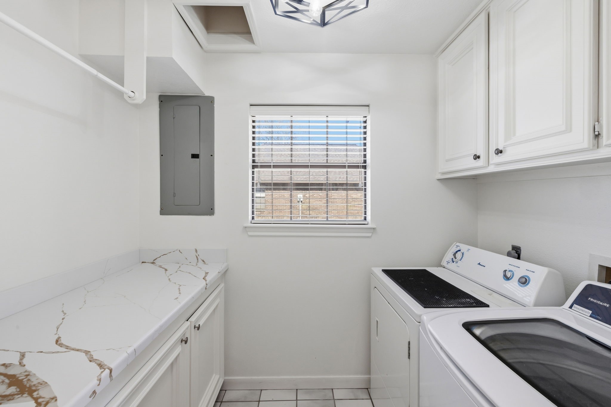 310 Pecan Loop Drive Baytown, TX 77523 - Photo 26 of 43 a utility room with a sink dryer and washer