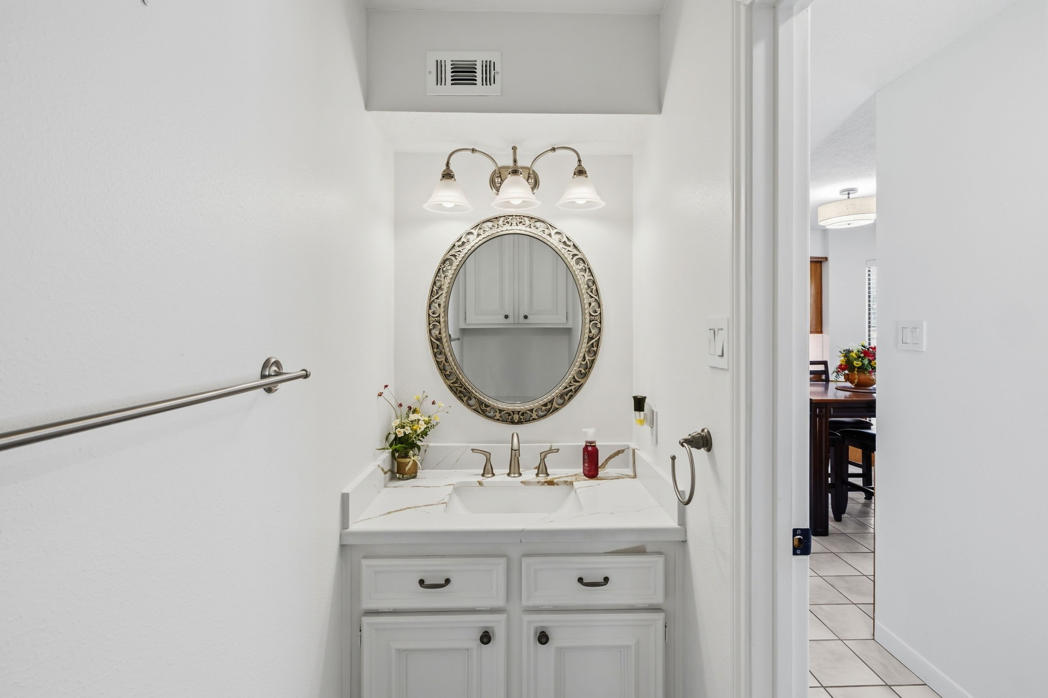 310 Pecan Loop Drive Baytown, TX 77523 - Photo 27 of 43 a bathroom with a sink and a mirror