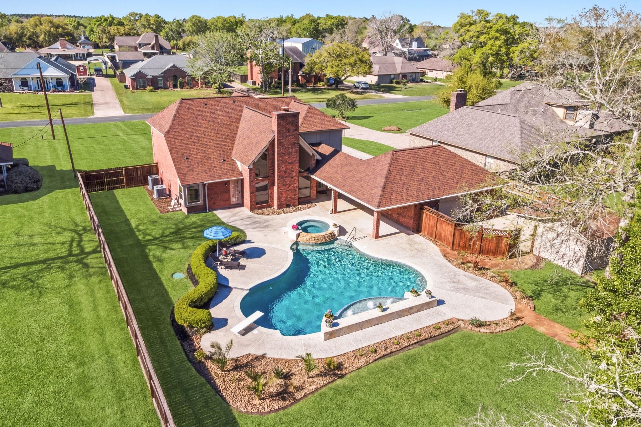 310 Pecan Loop Drive Baytown, TX 77523 - Photo 40 of 43 an aerial view of residential houses with outdoor space and parking
