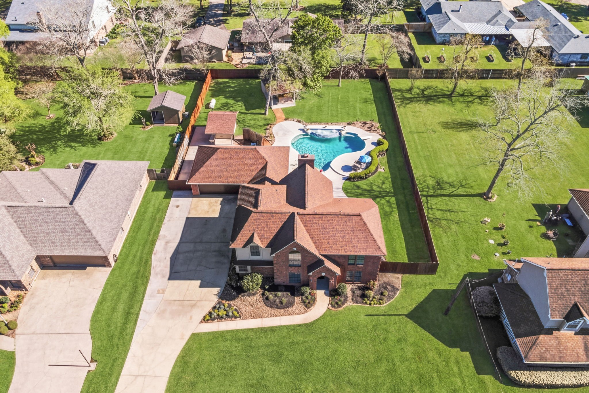 310 Pecan Loop Drive Baytown, TX 77523 - Photo 41 of 43 an aerial view of a house with garden space and street view