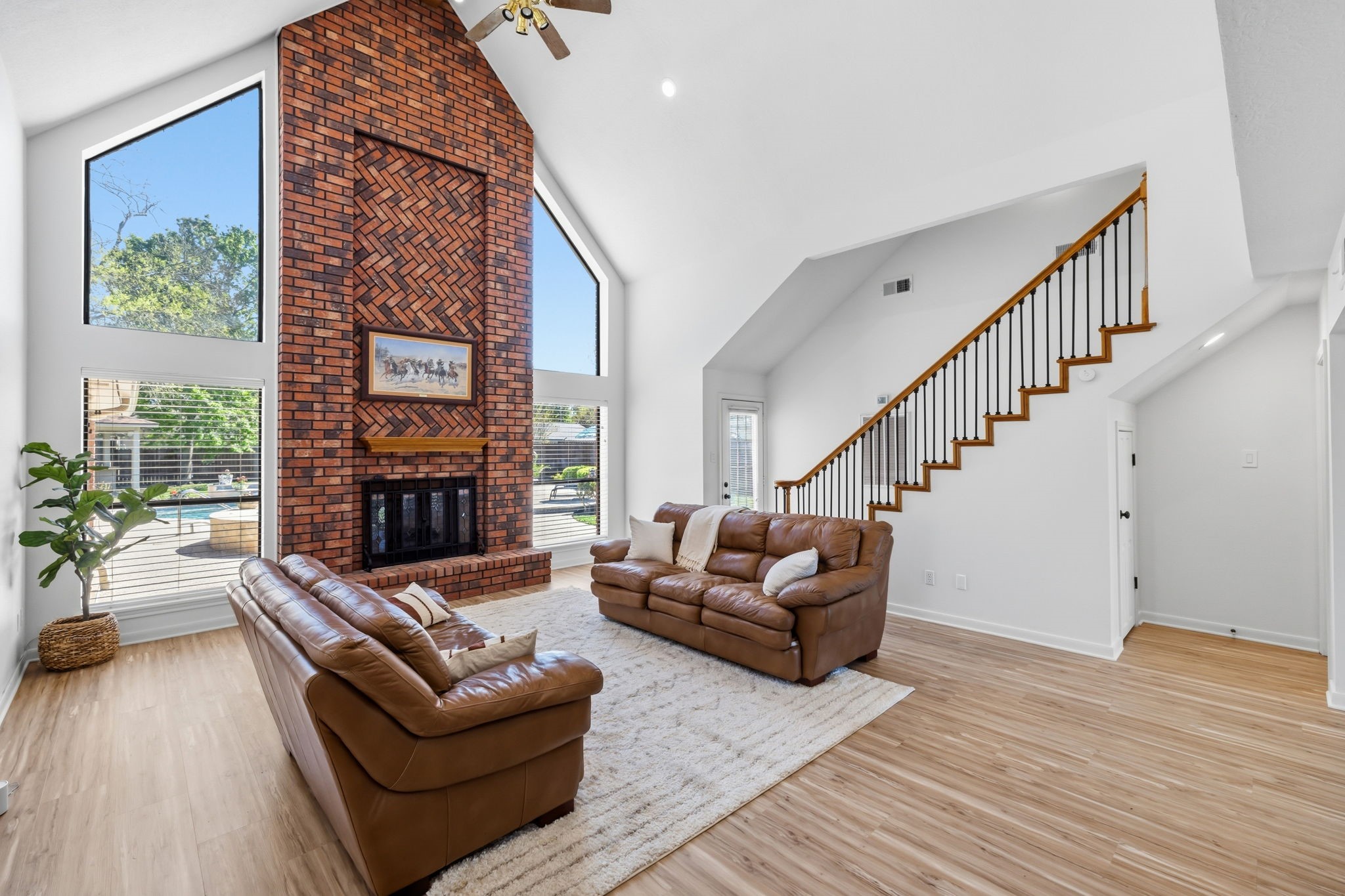 310 Pecan Loop Drive Baytown, TX 77523 - Photo 7 of 43 a living room with fireplace furniture and a wooden floor