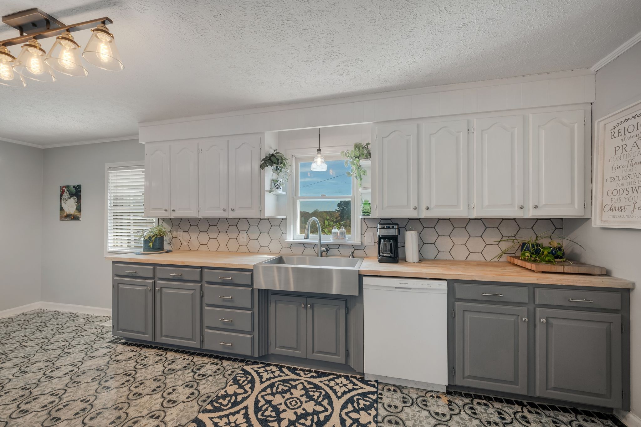 1971 Ridge Road McEwen, TN 37101 - Photo 13 of 40 a kitchen with a sink and cabinets