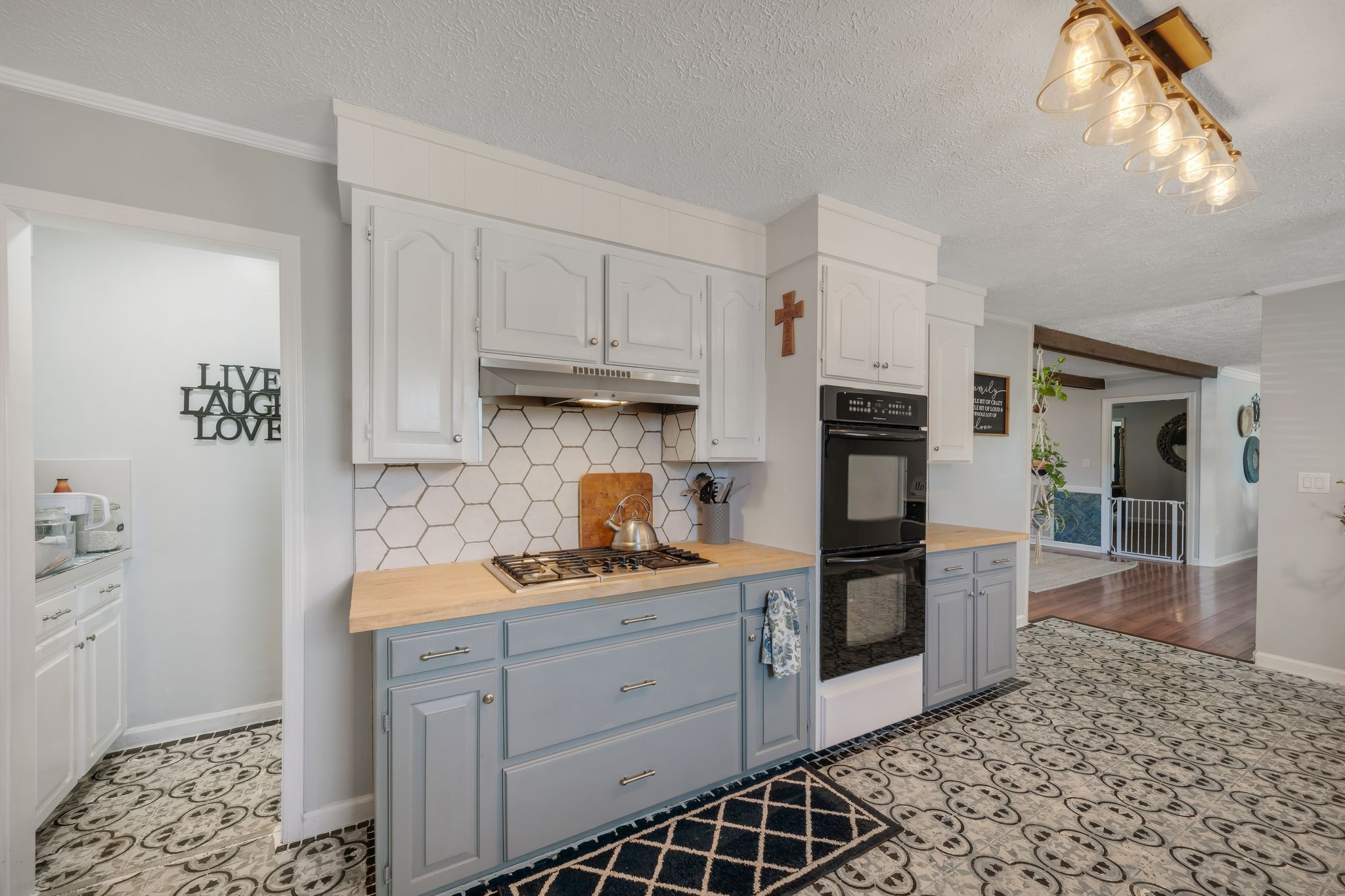 1971 Ridge Road McEwen, TN 37101 - Photo 14 of 40 a kitchen with stainless steel appliances granite countertop a refrigerator sink and cabinets