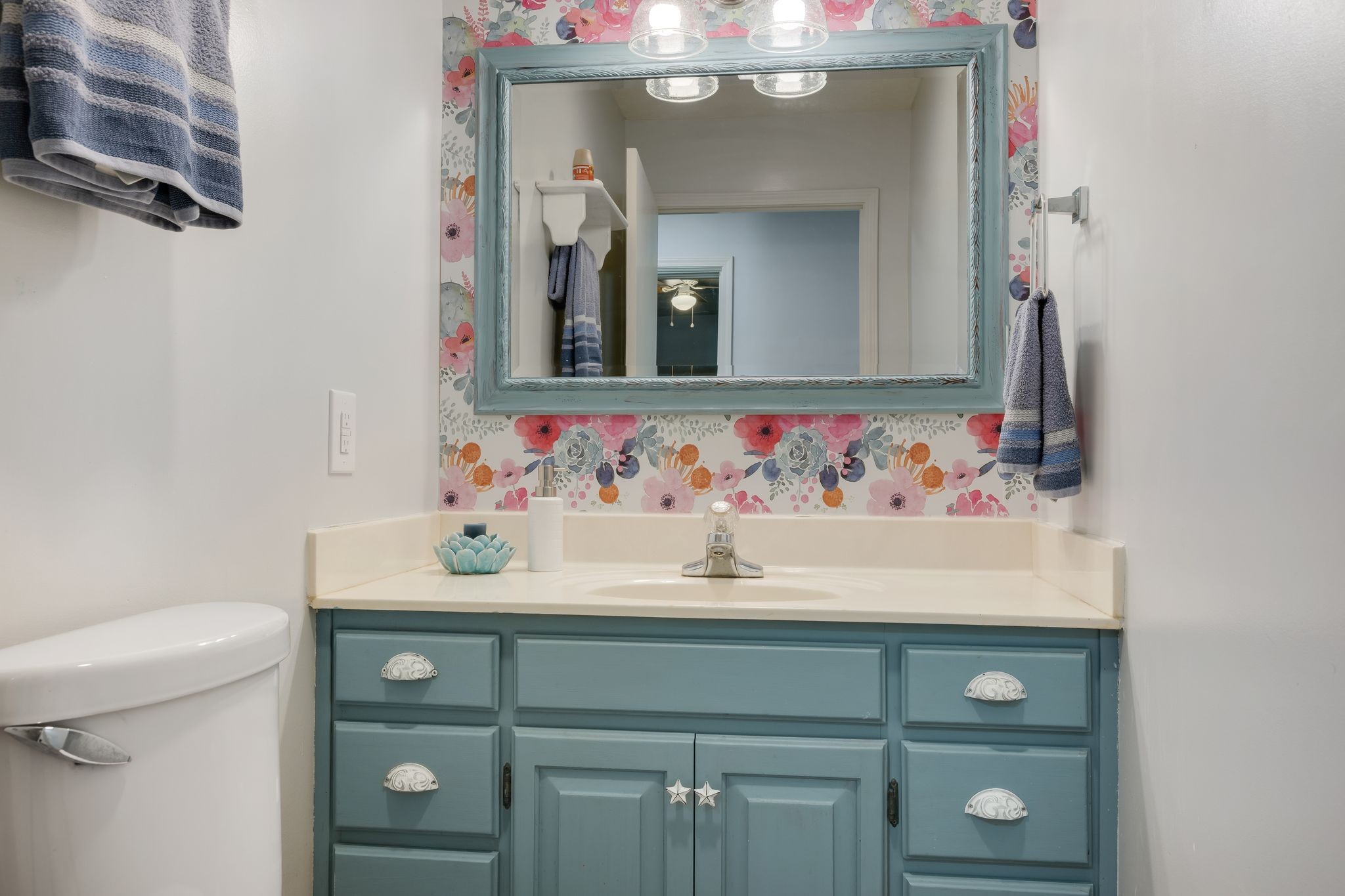 1971 Ridge Road McEwen, TN 37101 - Photo 16 of 40 a bathroom with a sink vanity and toilet