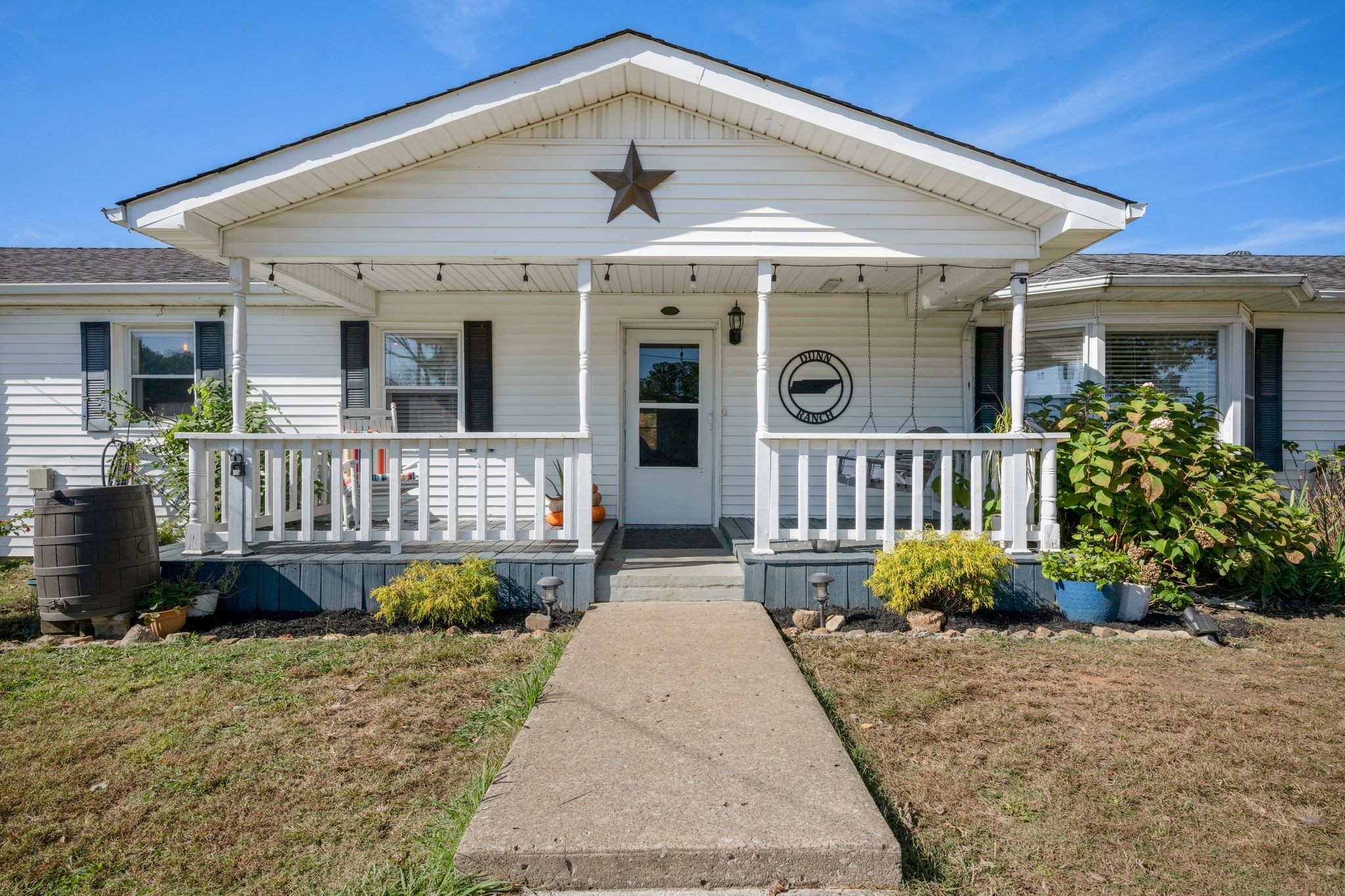 1971 Ridge Road McEwen, TN 37101 - Photo 2 of 40 a front view of a house with a porch