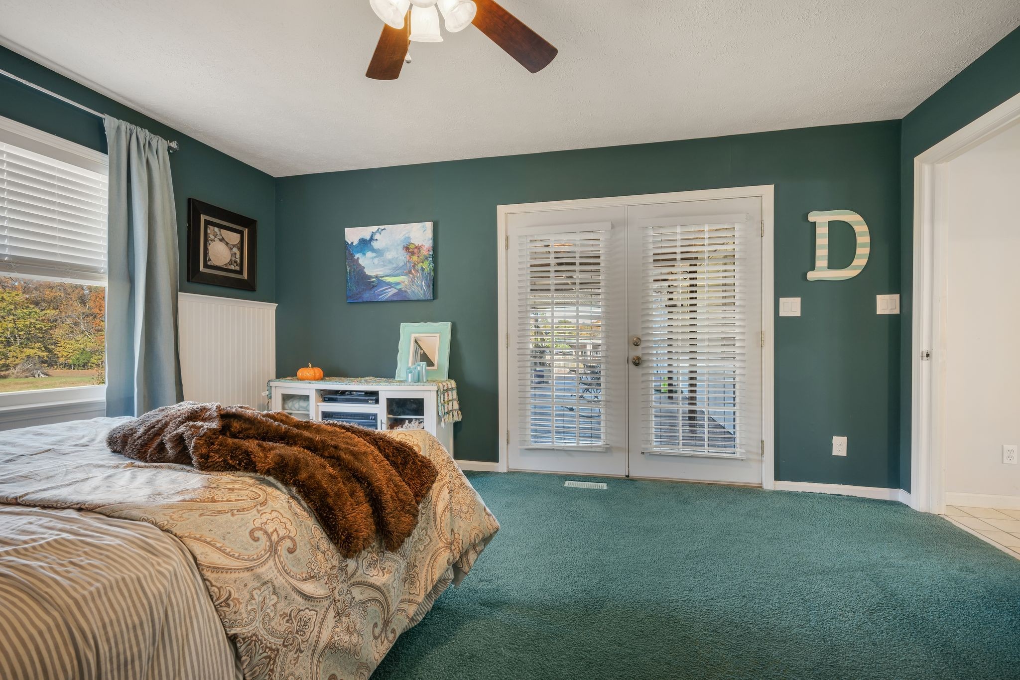 1971 Ridge Road McEwen, TN 37101 - Photo 25 of 40 a bedroom with a large bed and a window