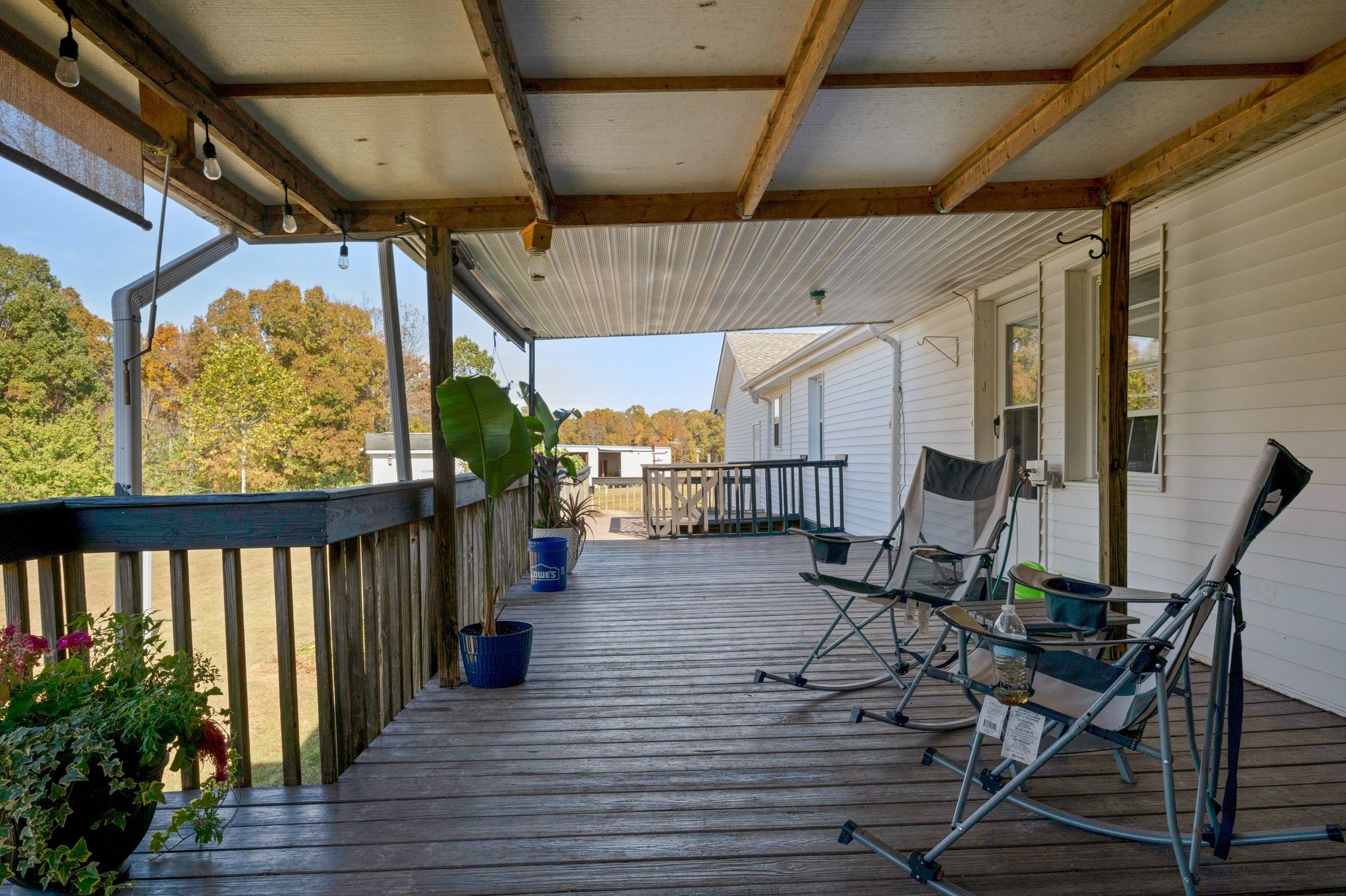 1971 Ridge Road McEwen, TN 37101 - Photo 32 of 40 a view of balcony with chairs and wooden floor