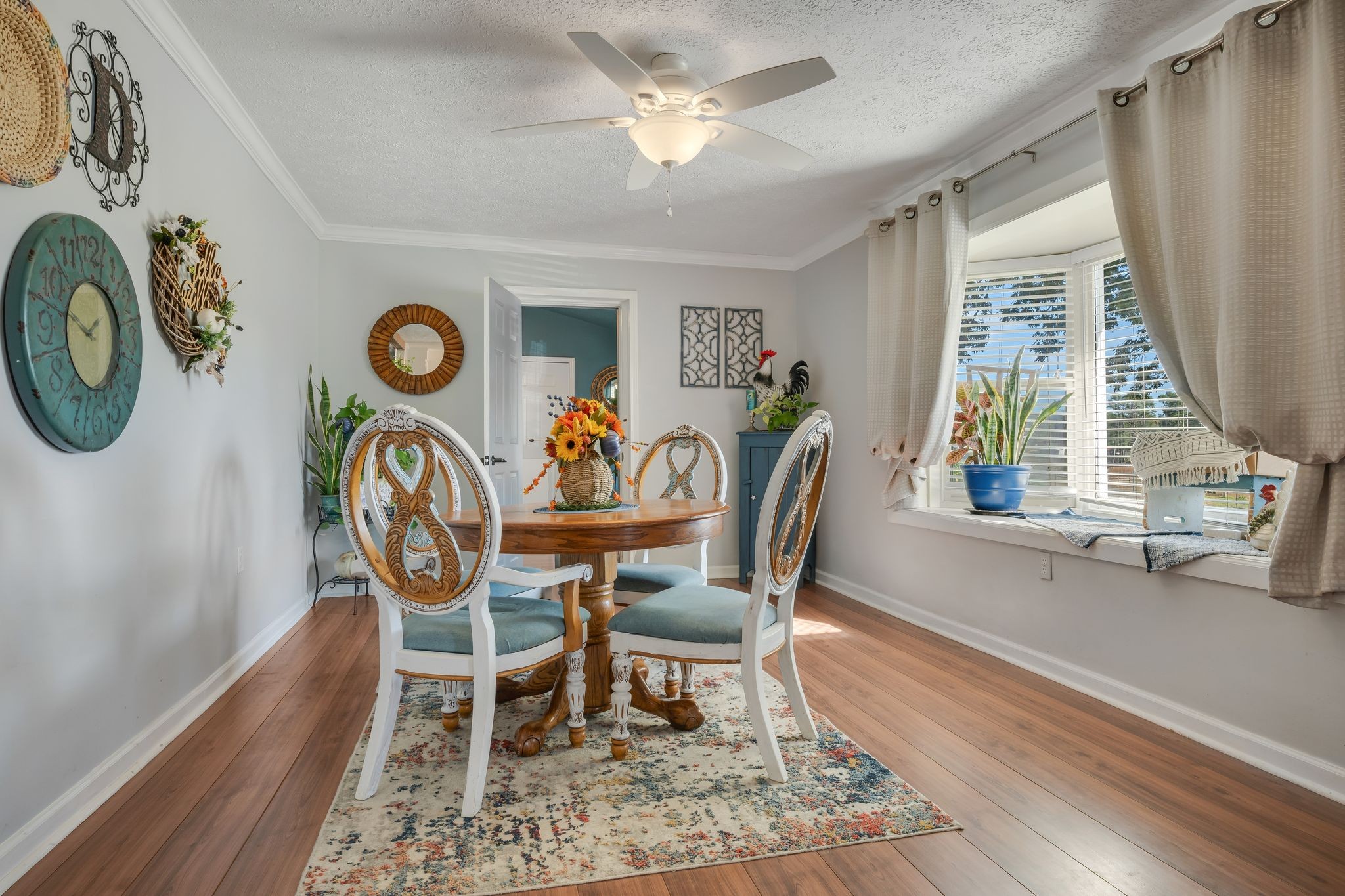 1971 Ridge Road McEwen, TN 37101 - Photo 5 of 40 a view of a dining room with furniture window and wooden floor
