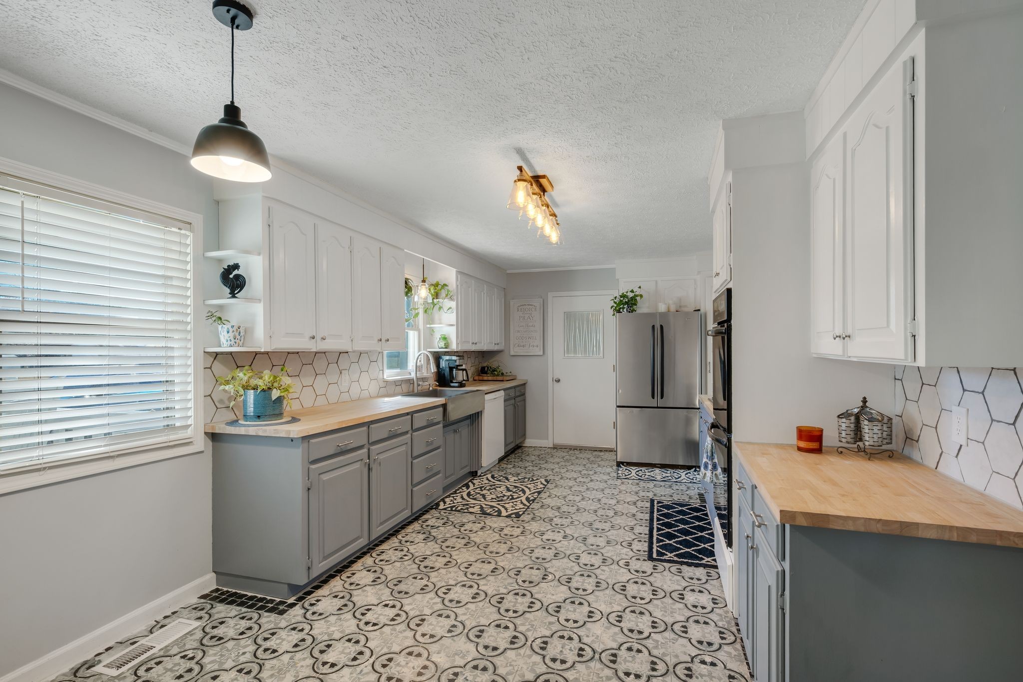 1971 Ridge Road McEwen, TN 37101 - Photo 10 of 40 a kitchen with a sink appliances and cabinets